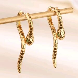 Gold Snake Earrings with Green Accent